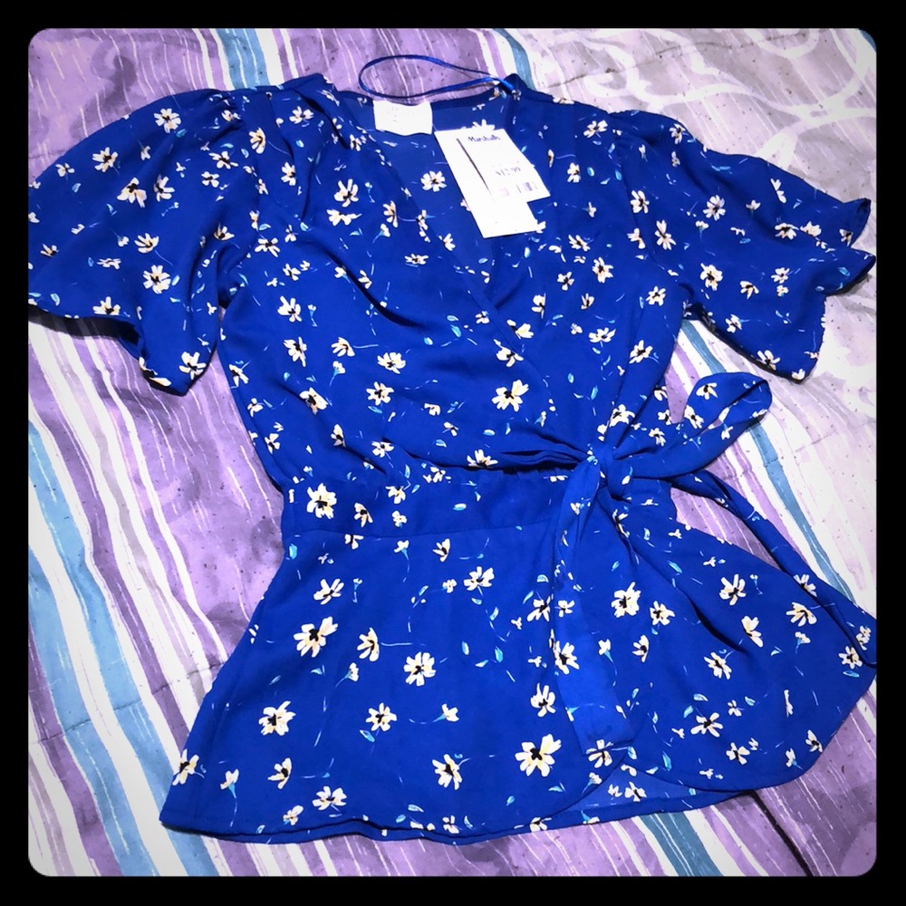 Blue peplum wrapped blouse